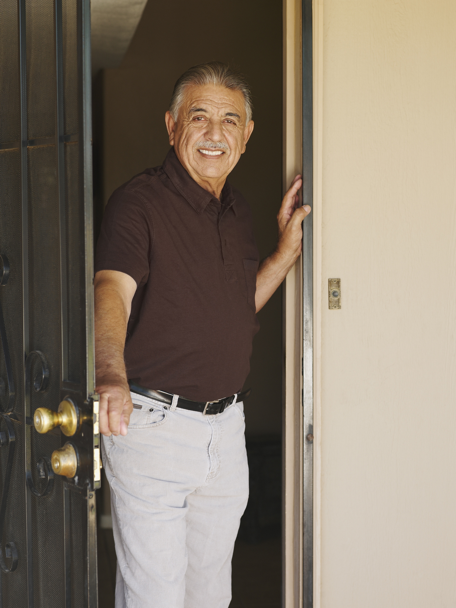 A Smiling Man Opening a Door | Usage Scenario Example